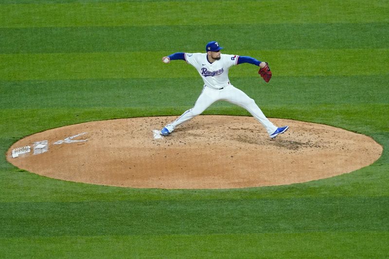 Apr 9, 2024; Arlington, Texas, USA; Texas Rangers pitcher Nathan Eovaldi (17) throws to the plate during the third inning against the Oakland Athletics at Globe Life Field. Mandatory Credit: Raymond Carlin III-USA TODAY Sports