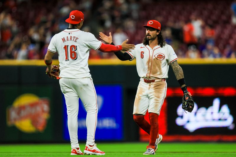 Jul 29, 2024; Cincinnati, Ohio, USA; Cincinnati Reds second baseman Jonathan India (6) high fives third baseman Noelvi Marte (16) after the victory over the Chicago Cubs at Great American Ball Park. Mandatory Credit: Katie Stratman-USA TODAY Sports