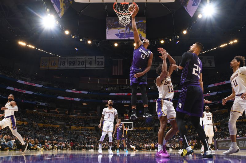 LOS ANGELES, CA - OCTOBER 26: Keegan Murray #13 of the Sacramento Kings dunks the ball during the game against the Los Angeles Lakers on October 26, 2024 at Crypto.Com Arena in Los Angeles, California. NOTE TO USER: User expressly acknowledges and agrees that, by downloading and/or using this Photograph, user is consenting to the terms and conditions of the Getty Images License Agreement. Mandatory Copyright Notice: Copyright 2024 NBAE (Photo by Adam Pantozzi/NBAE via Getty Images)