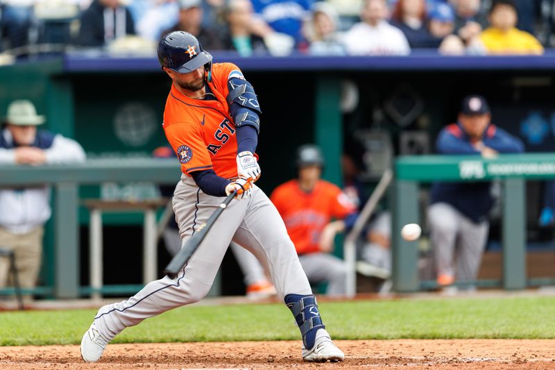 Apr 27, 2025; Kansas City, Missouri, USA; Houston Astros shortstop Jeremy Peña (3) at bat during the seventh inning against the Kansas City Royals at Kauffman Stadium. Mandatory Credit: William Purnell-Imagn Images