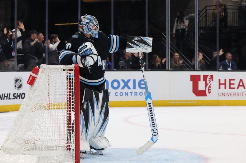 Mar 20, 2025; Salt Lake City, Utah, USA; Utah Hockey Club goaltender Karel Vejmelka (70) waits for play against the Buffalo Sabres during the third period at Delta Center. Mandatory Credit: Rob Gray-Imagn Images