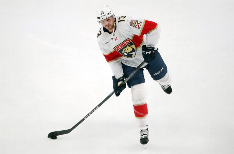 Dec 3, 2024; Pittsburgh, Pennsylvania, USA;  Florida Panthers center Sam Reinhart (13) warms up against the Pittsburgh Penguins at PPG Paints Arena. Mandatory Credit: Charles LeClaire-Imagn Images