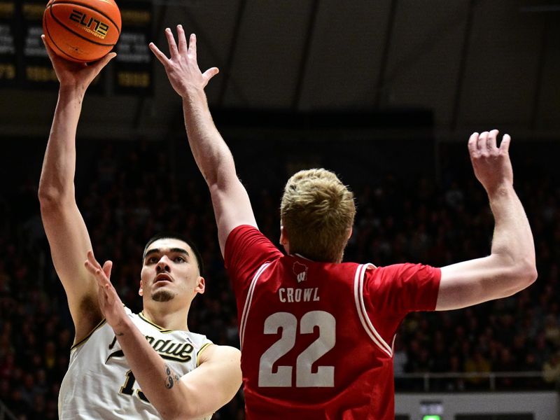 Mar 10, 2024; West Lafayette, Indiana, USA; Purdue Boilermakers center Zach Edey (15) shoots the ball over Wisconsin Badgers forward Steven Crowl (22) during the second half at Mackey Arena. Mandatory Credit: Marc Lebryk-USA TODAY Sports