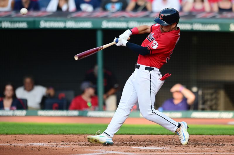 Jun 19, 2024; Cleveland, Ohio, USA; Cleveland Guardians left fielder Steven Kwan (38) hits a home run during the second inning against the Seattle Mariners at Progressive Field. Mandatory Credit: Ken Blaze-USA TODAY Sports