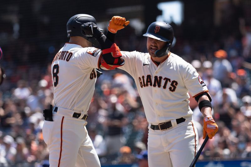 Aug 13, 2023; San Francisco, California, USA; San Francisco Giants right fielder Michael Conforto (8) and third baseman J.D. Davis (7) celebrate during the second inning against the Texas Rangers at Oracle Park. Mandatory Credit: Stan Szeto-USA TODAY Sports