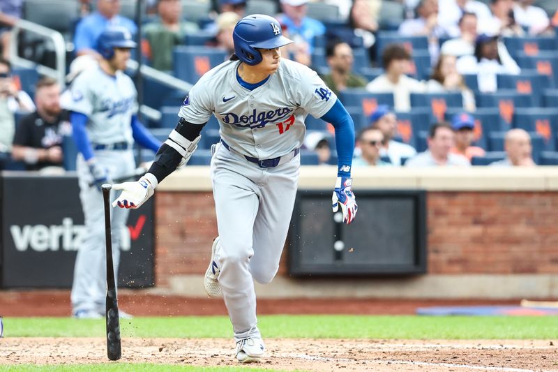 May 29, 2024; New York City, New York, USA;  Los Angeles Dodgers designated hitter Shohei Ohtani (17) hits an RBI single in the fifth inning against the New York Mets at Citi Field. Mandatory Credit: Wendell Cruz-USA TODAY Sports