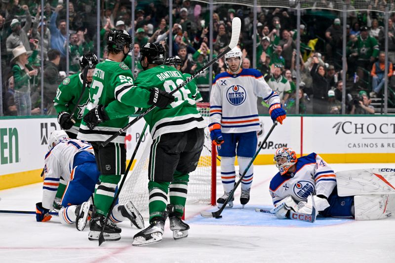 Nov 4, 2025; Dallas, Texas, USA; Dallas Stars center Wyatt Johnston (53) and right wing Mikko Rantanen (96) celebrates a goal scored by Rantanen against Edmonton Oilers goaltender Stuart Skinner (74) during the second period at the American Airlines Center. Rantanen scores his 300th career NHL goal. Mandatory Credit: Jerome Miron-Imagn Images