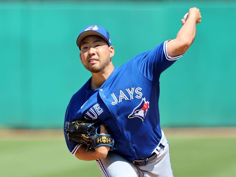 Mar 12, 2023; Clearwater, Florida, USA; Toronto Blue Jays starting pitcher Yusei Kikuchi (16) throws a pitch against the Philadelphia Phillies during the second inning at BayCare Ballpark. Mandatory Credit: Kim Klement-USA TODAY Sports