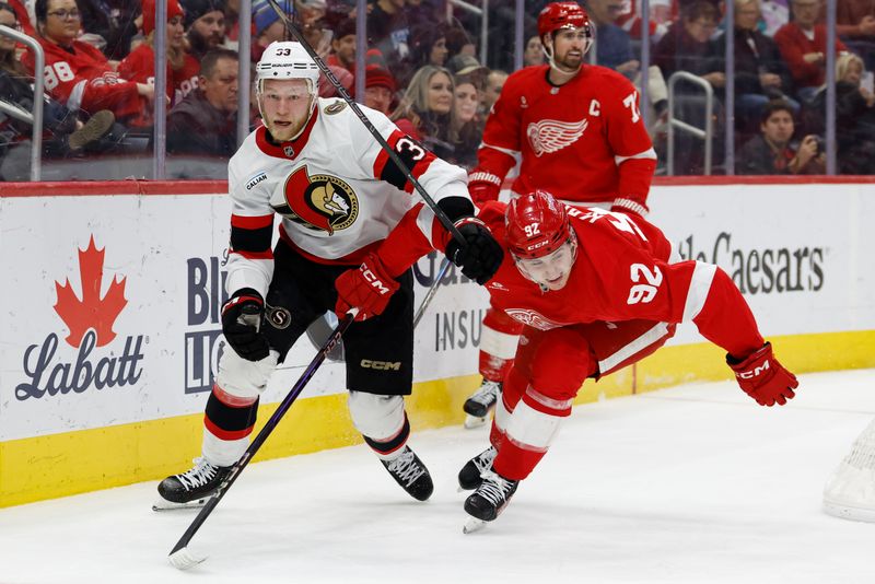 Jan 7, 2025; Detroit, Michigan, USA; Ottawa Senators defenseman Nikolas Matinpalo (33) and Detroit Red Wings center Marco Kasper (92) fight for position in the second period at Little Caesars Arena. Mandatory Credit: Rick Osentoski-Imagn Images