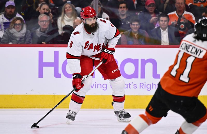 Nov 28, 2023; Philadelphia, Pennsylvania, USA; Carolina Hurricanes defenseman Brent Burns (8) controls the puck against the Philadelphia Flyers in the first period at Wells Fargo Center. Mandatory Credit: Kyle Ross-USA TODAY Sports