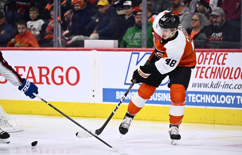 Jan 20, 2024; Philadelphia, Pennsylvania, USA; Philadelphia Flyers center Morgan Frost (48) passes the puck against the Colorado Avalanche in the second period at Wells Fargo Center. Mandatory Credit: Kyle Ross-USA TODAY Sports