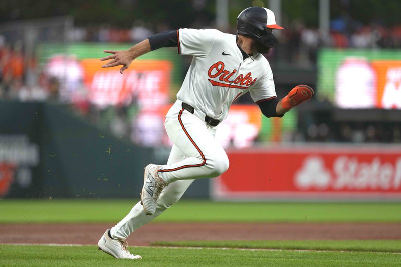 Apr 30, 2024; Baltimore, Maryland, USA; Baltimore Orioles outfielder Colton Cowser (17) rounds third base to score on a hit by designated hitter Alley Rutschman (not shown) in the fourth inning against the New York Yankees at Oriole Park at Camden Yards. Mandatory Credit: Mitch Stringer-USA TODAY Sports