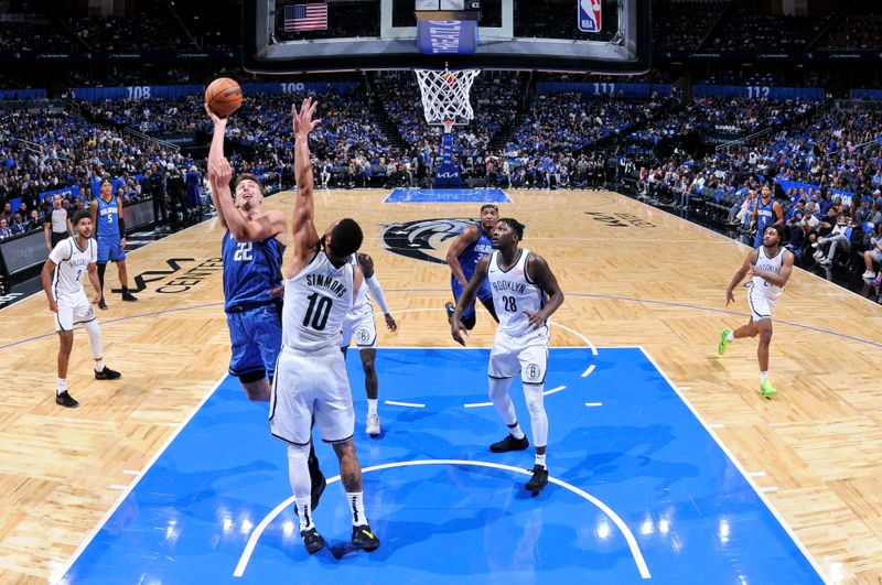 ORLANDO, FL - OCTOBER 25: Franz Wagner #22 of the Orlando Magic drives to the basket during the game against the Brooklyn Nets on October 25, 2024 at Kia Center in Orlando, Florida. NOTE TO USER: User expressly acknowledges and agrees that, by downloading and or using this photograph, User is consenting to the terms and conditions of the Getty Images License Agreement. Mandatory Copyright Notice: Copyright 2024 NBAE (Photo by Fernando Medina/NBAE via Getty Images)