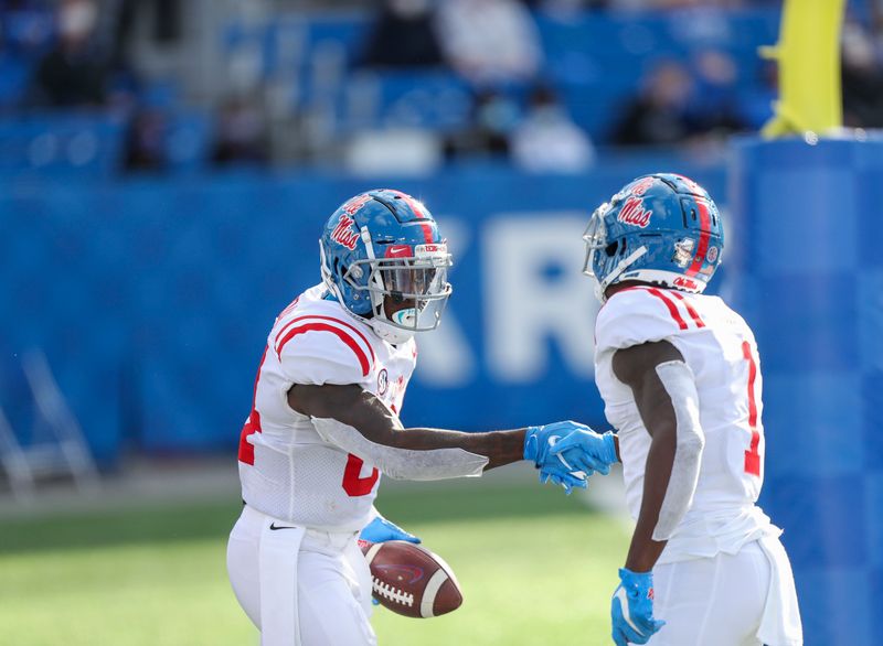 Oct 3, 2020; Lexington, Kentucky, USA; Mississippi Rebels tight end Kenny Yeboah (84) shakes hands with Mississippi Rebels wide receiver Jonathan Mingo (1) after a scoring a touchdown in the first half against Kentucky at Kroger Field. Mandatory Credit: Katie Stratman-USA TODAY Sports