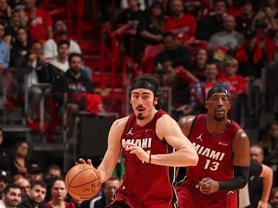 MIAMI, FL - DECEMBER 25:  Jaime Jaquez Jr. #11 of the Miami Heat handles the ball during the game  on December 25, 2023 at Kaseya Center Arena in Miami, Florida. NOTE TO USER: User expressly acknowledges and agrees that, by downloading and or using this Photograph, user is consenting to the terms and conditions of the Getty Images License Agreement. Mandatory Copyright Notice: Copyright 2023 NBAE (Photo by Issac Baldizon/NBAE via Getty Images)