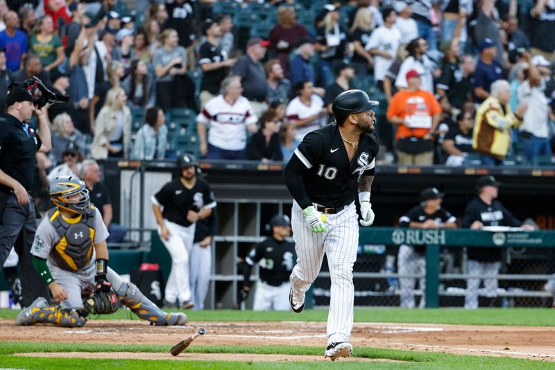 Aug 26, 2023; Chicago, Illinois, USA; Chicago White Sox third baseman Yoan Moncada (10) watches his three-run home run against the Oakland Athletics during the third inning at Guaranteed Rate Field. Mandatory Credit: Kamil Krzaczynski-USA TODAY Sports