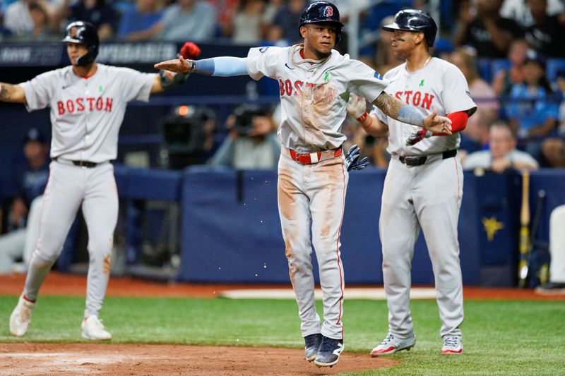 May 22, 2024; St. Petersburg, Florida, USA;  Boston Red Sox outfielder Ceddanne Rafaela (43) celebrates after scoring a run against the Tampa Bay Rays in the fifth inning at Tropicana Field. Mandatory Credit: Nathan Ray Seebeck-USA TODAY Sports