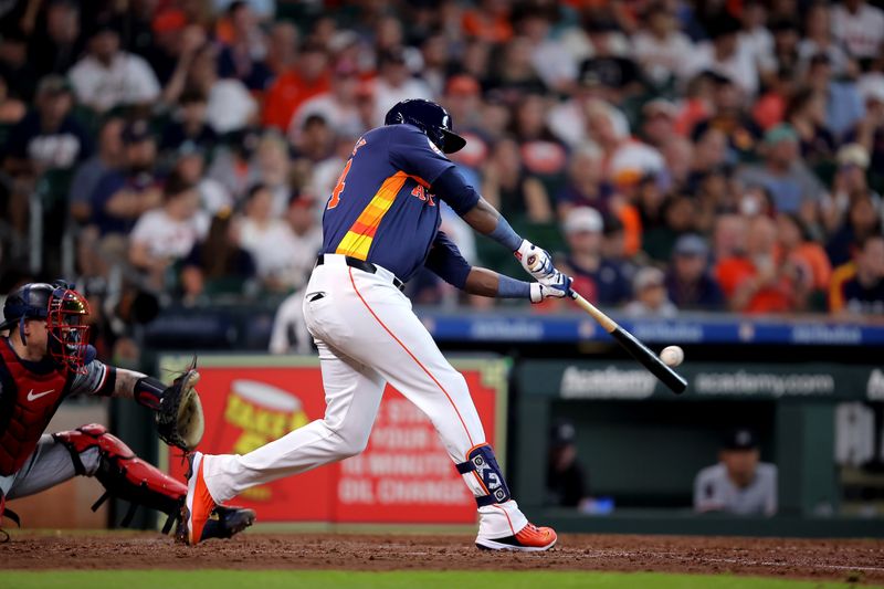 Jun 1, 2024; Houston, Texas, USA; Houston Astros designated hitter Yordan Alvarez (44) hits a single against the Minnesota Twins during the seventh inning at Minute Maid Park. Mandatory Credit: Erik Williams-USA TODAY Sports