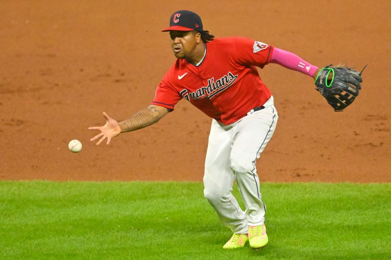 Aug 8, 2023; Cleveland, Ohio, USA; Cleveland Guardians third baseman Jose Ramirez (11) reaches for a ground ball in the ninth inning against the Toronto Blue Jays at Progressive Field. Mandatory Credit: David Richard-USA TODAY Sports