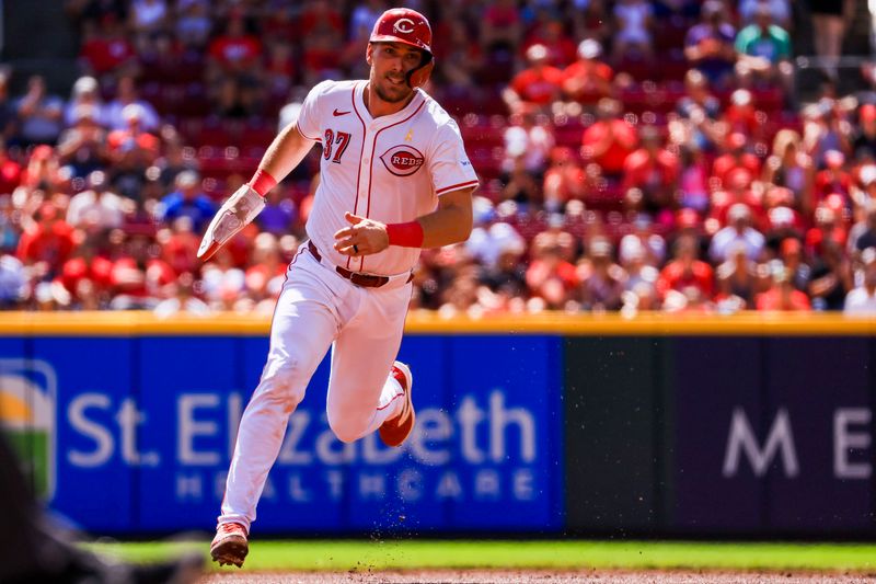 Sep 1, 2024; Cincinnati, Ohio, USA; Cincinnati Reds catcher Tyler Stephenson (37) runs to third on a single hit by outfielder TJ Friedl (not pictured) in the first inning against the Milwaukee Brewers at Great American Ball Park. Mandatory Credit: Katie Stratman-USA TODAY Sports