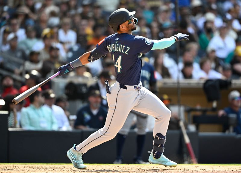 May 18, 2025; San Diego, California, USA; Seattle Mariners center fielder Julio Rodriguez (44) hits an RBI single during the ninth inning against the San Diego Padres at Petco Park. Mandatory Credit: Denis Poroy-Imagn Images