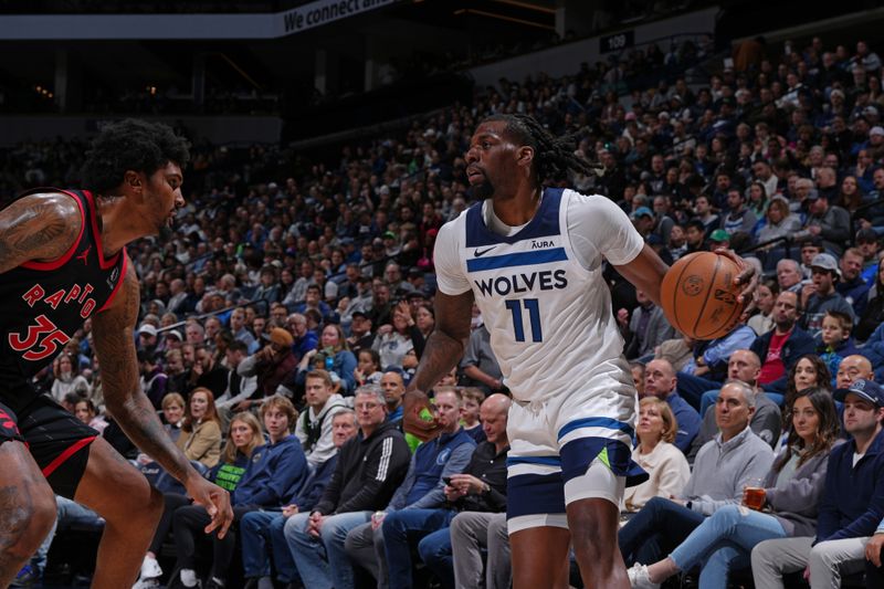 MINNEAPOLIS, MN -  APRIL 3:  Naz Reid #11 of the Minnesota Timberwolves dribbles the ball during the game against the Toronto Raptors on April 3, 2024 at Target Center in Minneapolis, Minnesota. NOTE TO USER: User expressly acknowledges and agrees that, by downloading and or using this Photograph, user is consenting to the terms and conditions of the Getty Images License Agreement. Mandatory Copyright Notice: Copyright 2024 NBAE (Photo by Jordan Johnson/NBAE via Getty Images)