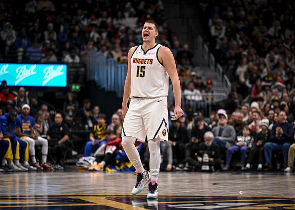 DENVER, CO - DECEMBER 25: Nikola Jokic (15) of the Denver Nuggets instructs teammates during the third quarter against the Golden State Warriors at Ball Arena in Denver on Monday, December 25, 2023. (Photo by AAron Ontiveroz/The Denver Post)