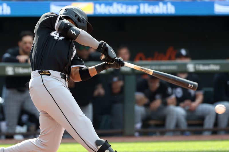 May 31, 2025; Baltimore, Maryland, USA; Chicago White Sox outfielder Joshua Palacios (47) hits a single during the fourth inning against the Baltimore Orioles at Oriole Park at Camden Yards. Mandatory Credit: Daniel Kucin Jr.-Imagn Images