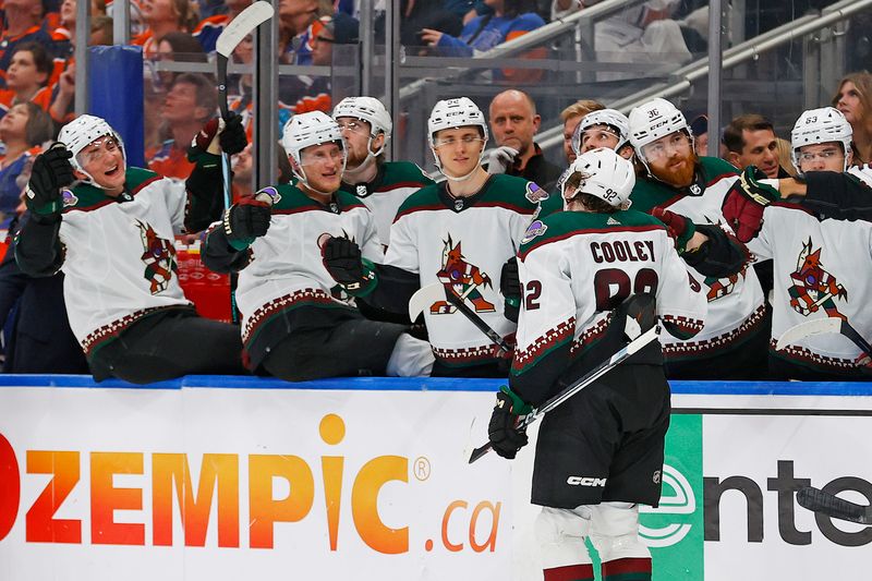 Apr 12, 2024; Edmonton, Alberta, CAN; The Arizona Coyotes celebrate a goal scored by forward Logan Cooley (92) during the second period against the Edmonton Oilers at Rogers Place. Mandatory Credit: Perry Nelson-USA TODAY Sports