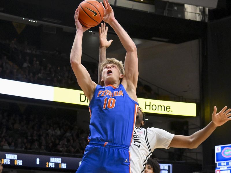 Jan 17, 2026; Nashville, Tennessee, USA;  Florida Gators forward Thomas Haugh (10) shoots the ball against the Vanderbilt Commodores during the first half at Memorial Gymnasium. Mandatory Credit: Steve Roberts-Imagn Images