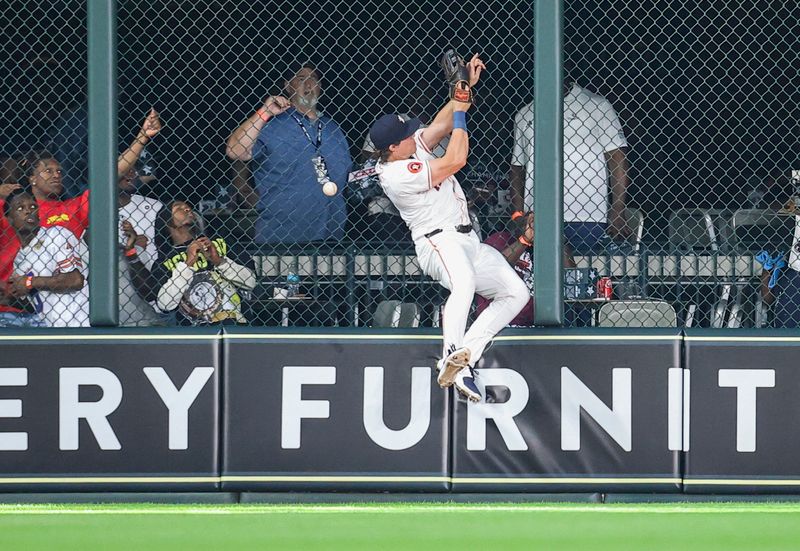 Jun 22, 2024; Houston, Texas, USA; Houston Astros center fielder Jake Meyers (6) is unable to catch a fly ball during the seventh inning against the Baltimore Orioles at Minute Maid Park. Mandatory Credit: Troy Taormina-USA TODAY Sports