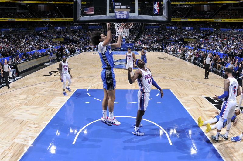 ORLANDO, FL - JANUARY 19: Anthony Black #0 of the Orlando Magic dunks the ball during the game against the Philadelphia 76ers on January 19, 2024 at the Kia Center in Orlando, Florida. NOTE TO USER: User expressly acknowledges and agrees that, by downloading and or using this photograph, User is consenting to the terms and conditions of the Getty Images License Agreement. Mandatory Copyright Notice: Copyright 2024 NBAE (Photo by Fernando Medina/NBAE via Getty Images)