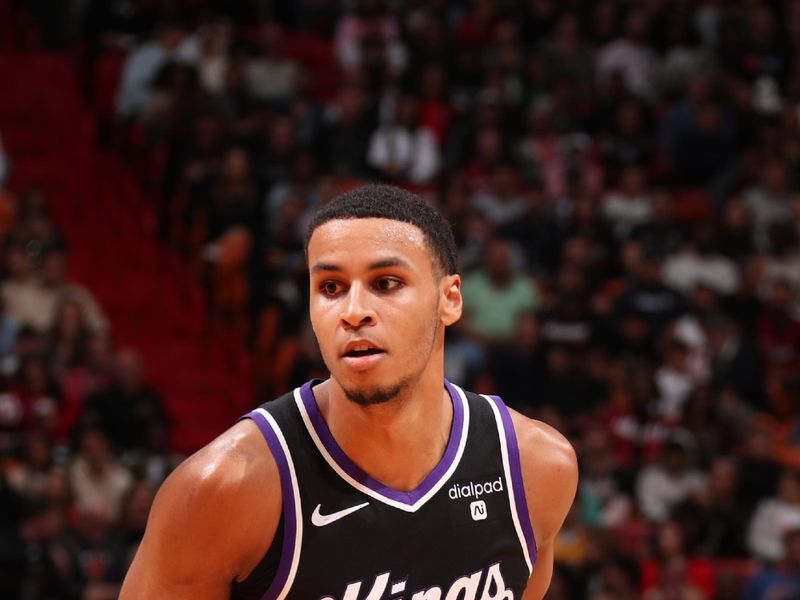 MIAMI, FL - JANUARY 31: Keegan Murray #13 of the Sacramento Kings handles the ball during the game against the Miami Heat on January 31, 2024 at Kaseya Center in Miami, Florida. NOTE TO USER: User expressly acknowledges and agrees that, by downloading and or using this Photograph, user is consenting to the terms and conditions of the Getty Images License Agreement. Mandatory Copyright Notice: Copyright 2024 NBAE (Photo by Issac Baldizon/NBAE via Getty Images)