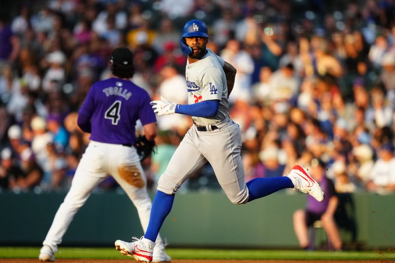 Jun 19, 2024; Denver, Colorado, USA; Los Angeles Dodgers outfielder Jason Heyward (23) runs off a two-run double in the fifth inning against the Colorado Rockies at Coors Field. Mandatory Credit: Ron Chenoy-USA TODAY Sports