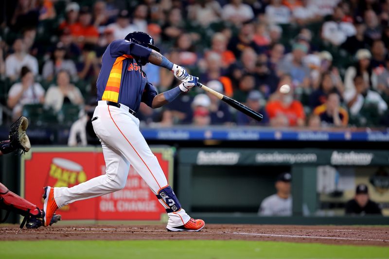 Jun 1, 2024; Houston, Texas, USA; Houston Astros designated hitter Yordan Alvarez (44) hits a two-run home run against the Minnesota Twins during the first inning at Minute Maid Park. Mandatory Credit: Erik Williams-USA TODAY Sports