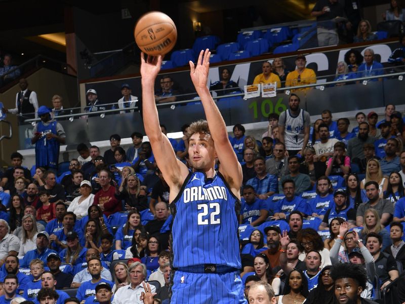 ORLANDO, FL - APRIL 25: Franz Wagner #22 of the Orlando Magic shoots a 3-point basket during the game   against the Cleveland Cavaliers during Round 1 Game 3 of the 2024 NBA Playoffs on April 25, 2024 at Kia Center in Orlando, Florida. NOTE TO USER: User expressly acknowledges and agrees that, by downloading and or using this photograph, User is consenting to the terms and conditions of the Getty Images License Agreement. Mandatory Copyright Notice: Copyright 2023 NBAE (Photo by Fernando Medina/NBAE via Getty Images)