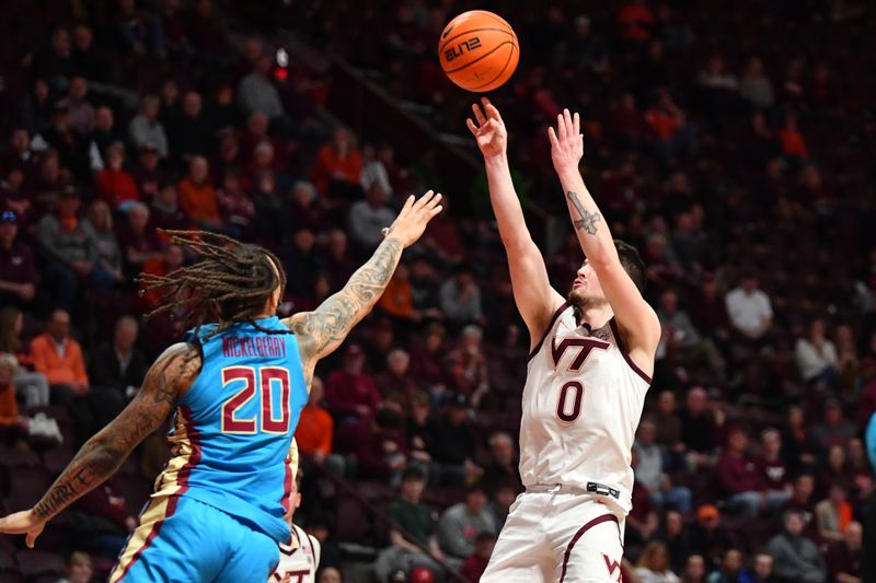 Feb 13, 2024; Blacksburg, Virginia, USA; Virginia Tech Hokies guard Hunter Cattoor (0) shoots over Florida State Seminoles guard Josh Nickelberry (20) during the second half at Cassell Coliseum. Mandatory Credit: Brian Bishop-USA TODAY Sports