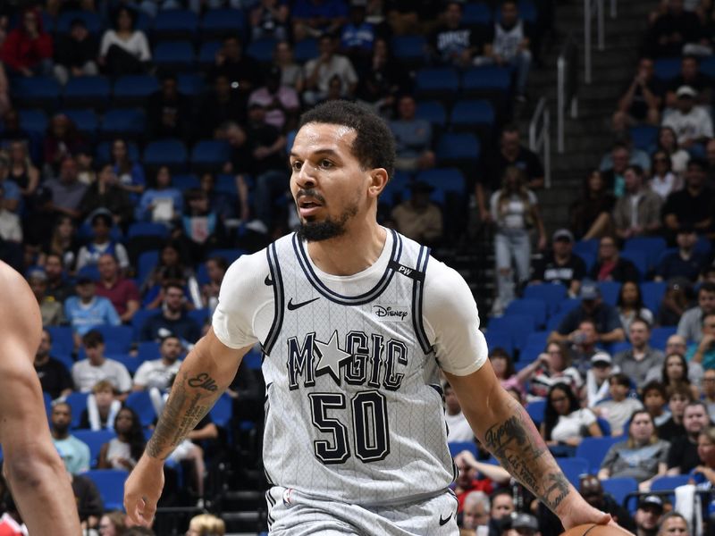 ORLANDO, FL - FEBRUARY 12:  Cole Anthony #50 of the Orlando Magic dribbles the ball during the game against the Charlotte Hornets on February 12, 2025 at Kia Center in Orlando, Florida. NOTE TO USER: User expressly acknowledges and agrees that, by downloading and or using this photograph, User is consenting to the terms and conditions of the Getty Images License Agreement. Mandatory Copyright Notice: Copyright 2025 NBAE (Photo by Fernando Medina/NBAE via Getty Images)