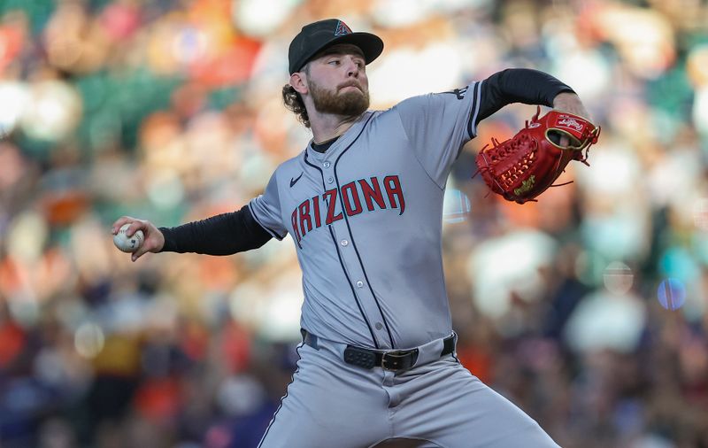 Sep 8, 2024; Houston, Texas, USA; Arizona Diamondbacks starting pitcher Ryne Nelson (19) delivers a pitch during the second inning against the Houston Astros at Minute Maid Park. Mandatory Credit: Troy Taormina-Imagn Images