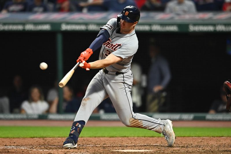 Jul 22, 2024; Cleveland, Ohio, USA; Detroit Tigers second baseman Colt Keith (33) hits a home run during the ninth inning against the Cleveland Guardians at Progressive Field. Mandatory Credit: Ken Blaze-USA TODAY Sports