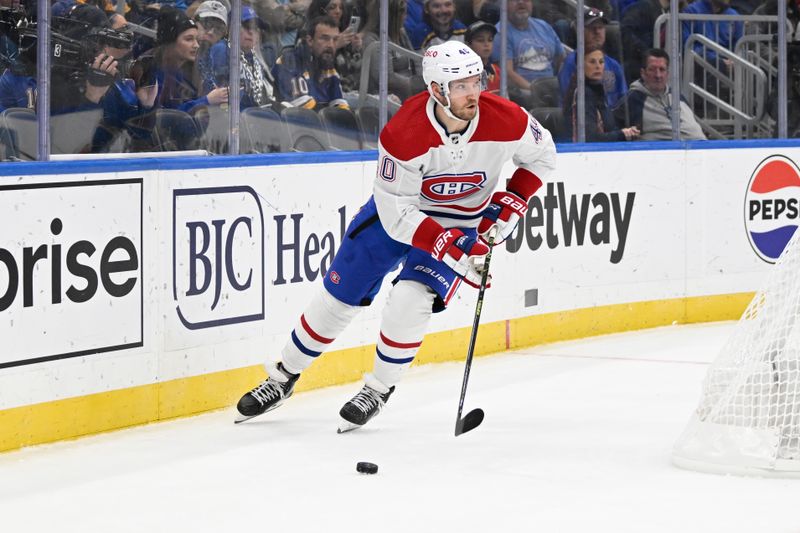 Nov 4, 2023; St. Louis, Missouri, USA; Montreal Canadiens right wing Joel Armia (40) controls the puck from the St. Louis Blues during the second period at Enterprise Center. Mandatory Credit: Jeff Le-USA TODAY Sports