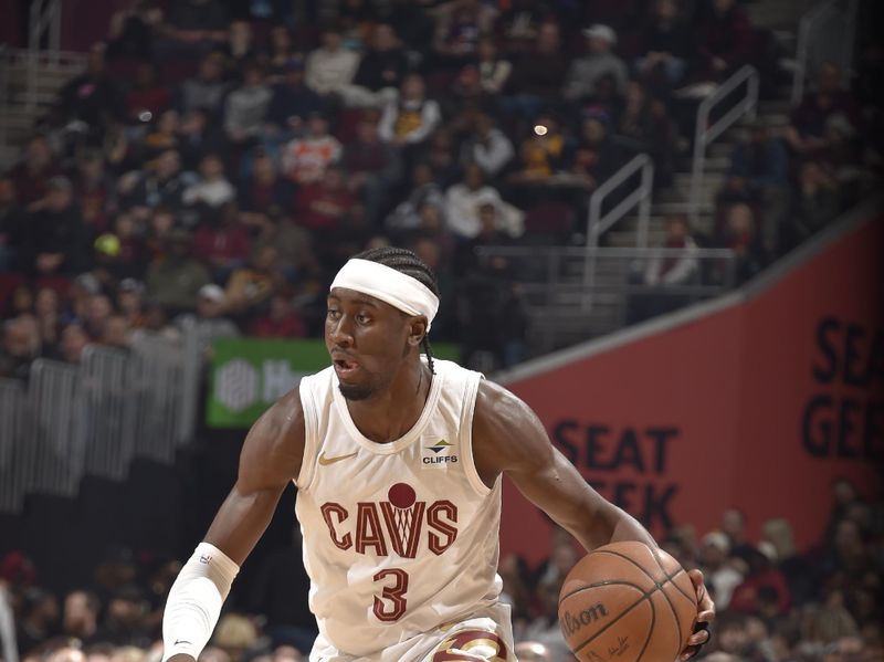 CLEVELAND, OH - MARCH 11: Caris LeVert #3 of the Cleveland Cavaliers handles the ball during the game against the Phoenix Suns on March 11, 2024 at Rocket Mortgage FieldHouse in Cleveland, Ohio. NOTE TO USER: User expressly acknowledges and agrees that, by downloading and/or using this Photograph, user is consenting to the terms and conditions of the Getty Images License Agreement. Mandatory Copyright Notice: Copyright 2024 NBAE (Photo by David Liam Kyle/NBAE via Getty Images)