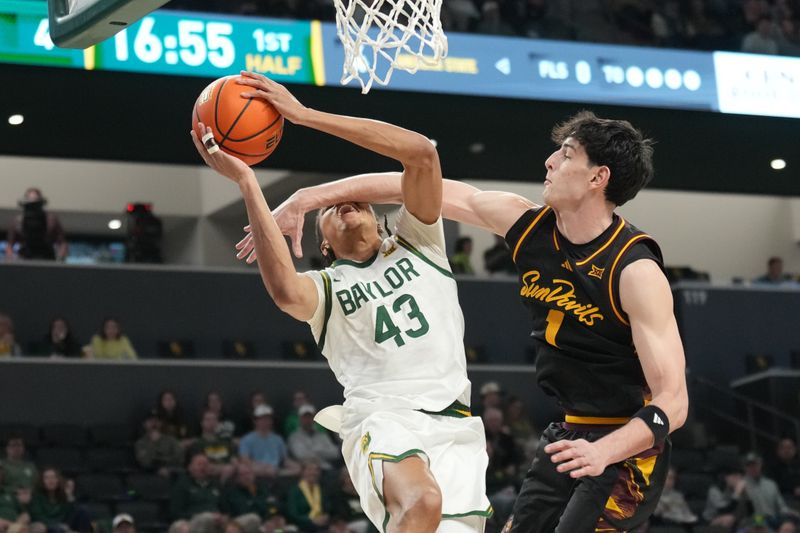 Feb 21, 2026; Waco, Texas, USA; Baylor Bears guard Cameron Carr (43) is fouled by Arizona State Sun Devils forward Santiago Trouet (1) during the first half at Paul and Alejandra Foster Pavilion. Mandatory Credit: Chris Jones-Imagn Images