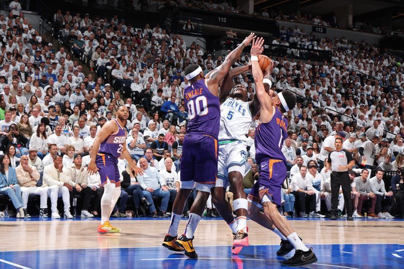 MINNEAPOLIS, MN -  APRIL 23: Anthony Edwards #5 of the Minnesota Timberwolves drives to the basket during the game against the Phoenix Suns during Round 1 Game 2 of the 2024 NBA Playoffs on April 23, 2024 at Target Center in Minneapolis, Minnesota. NOTE TO USER: User expressly acknowledges and agrees that, by downloading and or using this Photograph, user is consenting to the terms and conditions of the Getty Images License Agreement. Mandatory Copyright Notice: Copyright 2024 NBAE (Photo by David Sherman/NBAE via Getty Images)