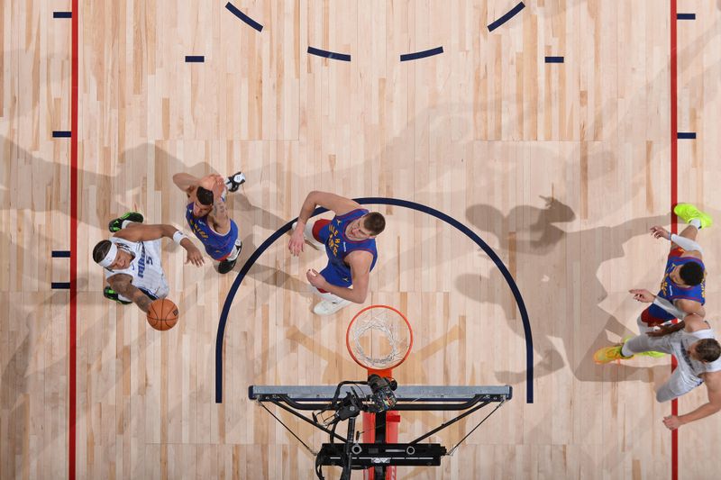 DENVER, CO - JANUARY 5: Paolo Banchero #5 of the Orlando Magic shoots the ball during the game against the Denver Nuggets on January 5, 2024 at the Ball Arena in Denver, Colorado. NOTE TO USER: User expressly acknowledges and agrees that, by downloading and/or using this Photograph, user is consenting to the terms and conditions of the Getty Images License Agreement. Mandatory Copyright Notice: Copyright 2024 NBAE (Photo by Bart Young/NBAE via Getty Images)