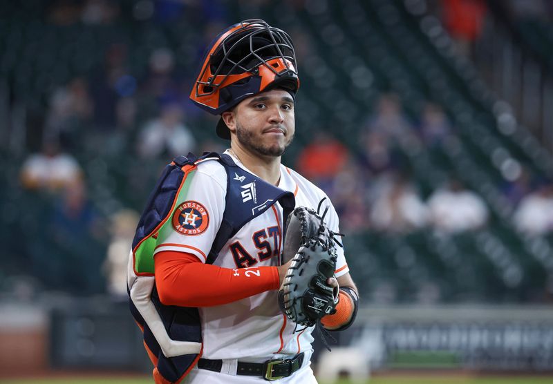 May 17, 2023; Houston, Texas, USA; Houston Astros catcher Yainer Diaz (21) walks on the field before the game against the Chicago Cubs at Minute Maid Park. Mandatory Credit: Troy Taormina-USA TODAY Sports