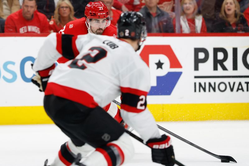 Mar 24, 2026; Detroit, Michigan, USA;  Detroit Red Wings center Dylan Larkin (71) skates with the puck in the second period against the Ottawa Senators at Little Caesars Arena. Mandatory Credit: Rick Osentoski-Imagn Images