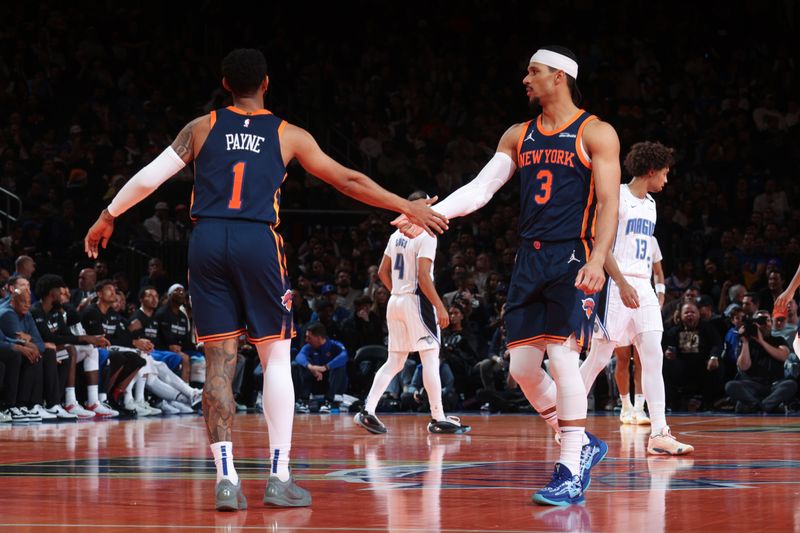 NEW YORK, NY - DECEMBER 3: Josh Hart #3 and Cameron Payne #1 of the New York Knicks high five during the game against the Orlando Magic during the Emirates NBA Cup on December 3, 2024 at Madison Square Garden in New York City, New York.  NOTE TO USER: User expressly acknowledges and agrees that, by downloading and or using this photograph, User is consenting to the terms and conditions of the Getty Images License Agreement. Mandatory Copyright Notice: Copyright 2024 NBAE  (Photo by Nathaniel S. Butler/NBAE via Getty Images)