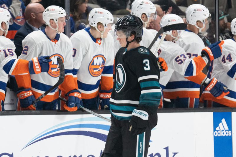 Mar 7, 2024; San Jose, California, USA; San Jose Sharks defenseman Henry Thrun (3) reacts in front of the New York Islanders during the second period at SAP Center at San Jose. Mandatory Credit: Stan Szeto-USA TODAY Sports