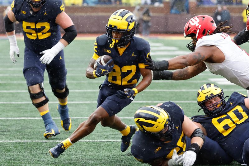 Oct 14, 2023; Ann Arbor, Michigan, USA; Michigan Wolverines wide receiver Semaj Morgan (82) runs the ball for a touchdown in the second half against the Indiana Hoosiers at Michigan Stadium. Mandatory Credit: Rick Osentoski-USA TODAY Sports